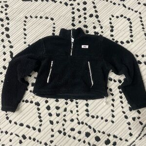 Nike Black Teddy Jacket with High Collar and Zip-Up Closure